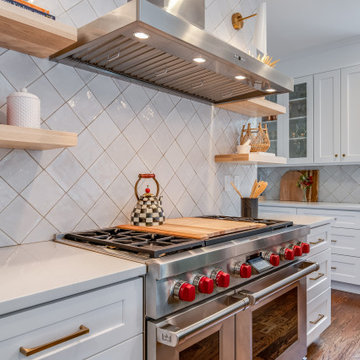 Chef’s Kitchen with Statement Range and Diagonal Tile Backsplash