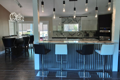 Example of a minimalist kitchen design in Other