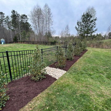 Custom Turf Landscape Area with Stone Border