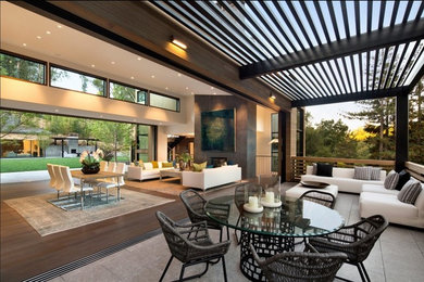 Example of a large trendy wood railing balcony design in San Francisco