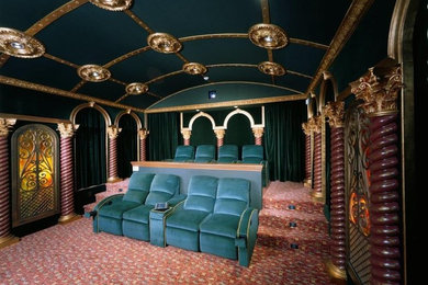 Inspiration for a mid-sized traditional enclosed home theatre in San Francisco with green walls, carpet and a built-in media wall.