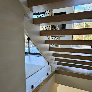 Project #111 | Open-Riser Staircase with Glass Panel Detail