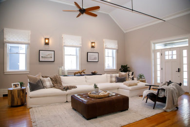 Example of a beach style living room design in Boston