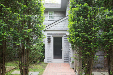 Immagine di un ampio ingresso o corridoio contemporaneo con parquet chiaro e pavimento beige