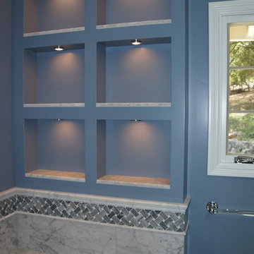 Marble Niches in Blue Bathroom