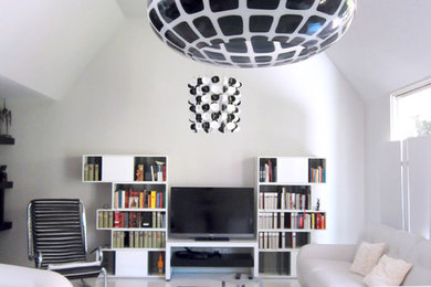 Inspiration for a modern living room in San Francisco with white walls.