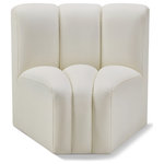 Meridian Furniture - Arc Upholstered Modular Component, Cream, 1-Piece: Curved Corner, Vegan Leather - Unleash modern opulence with the Arc Vegan Leather Curved Corner. Crafted for the modern connoisseur, this chair injects an air of refined luxury into any space. Its sleek silhouette, upholstered in supple cream vegan leather, exudes timeless sophistication while the deep channel tufting adds textural intrigue, further elevating the chair's visual appeal. The modular design makes it a versatile chameleon, effortlessly adapting to your evolving needs and preferences. Whether you envision it gracing a chic living room corner, basking in the glow of a bedroom window, or adding a touch of drama to a home office, the Arc seamlessly complements your unique interior aesthetic.