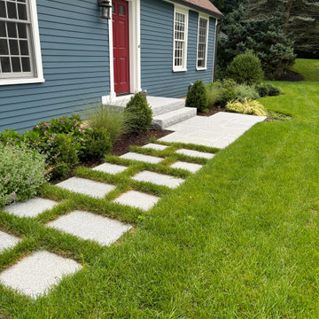 Cape style home front yard