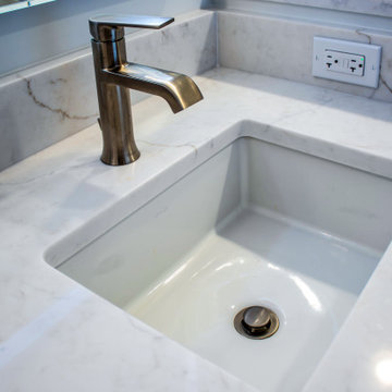 Primary Suite Remodel with Blue Cabinetry and Calacatta Miraggio Duo Quartz