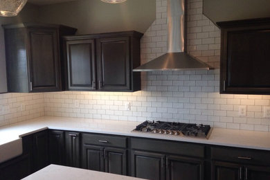 Arts and crafts kitchen photo in Other