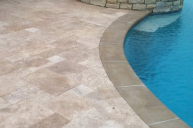 Pool fountain - mid-sized backyard concrete and custom-shaped natural pool fountain idea in Other