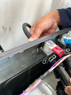 LG 3900 front loader leaking underneath.