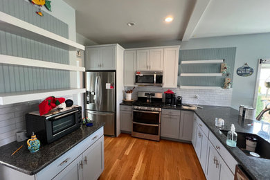 Example of a transitional kitchen design in Other