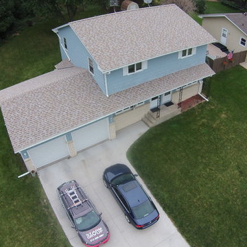New Owens Corning "Amber" color asphalt shingle roof.