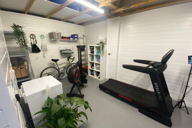 Contemporary home gym in Hampshire.