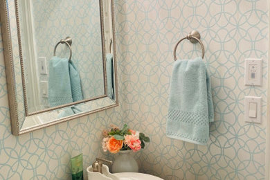 Inspiration for a small timeless powder room remodel in Other