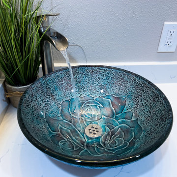 Glass Vessel Sink with Waterfall Faucet