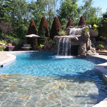 Faux Rock Concrete Waterfall with Swim Under Grotto