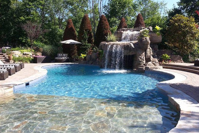 Faux Rock Concrete Waterfall with Swim Under Grotto