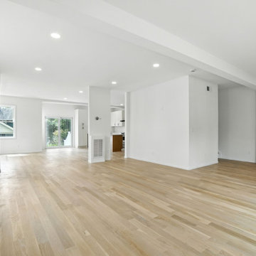 Open-Concept Living Area with Light Hardwood