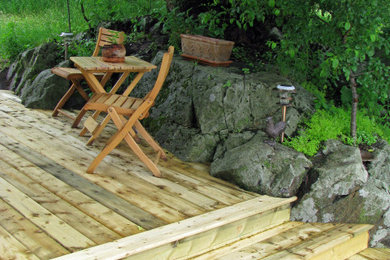Inspiration for a large deck remodel in Other