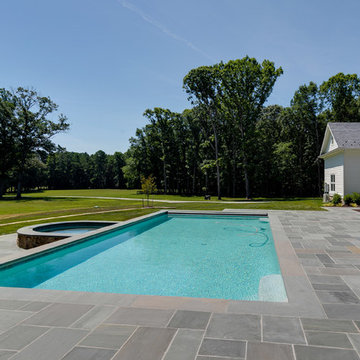 Bluestone Patio with a Pool and Spa