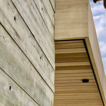 Contemporary Home with Board Formed Concrete and a Precast Cedar Fascia