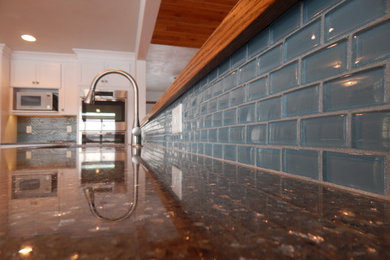 Kitchen - contemporary kitchen idea in Other