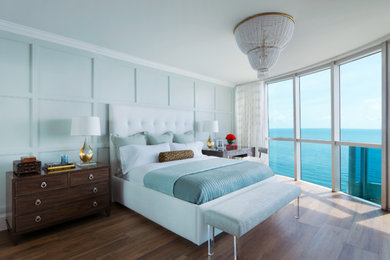 Example of a transitional bedroom design in Miami