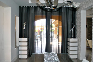 Example of a trendy dining room design in Miami