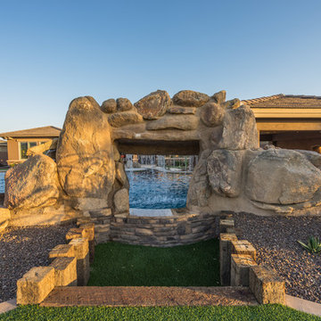 Natural Stone Freeform Pool + Perimeter Overflow Spa