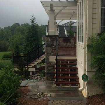 Zuri Deck with Cedar Pergola and Stone Fireplace with Grill