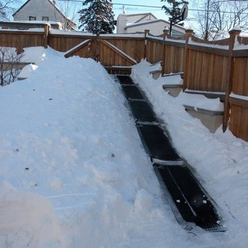 Kimberly easily clears snow off the "driveway from hell"