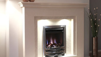 Limestone fireplace with a Gas fire