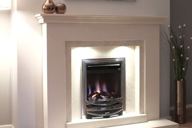 Limestone fireplace with a Gas fire