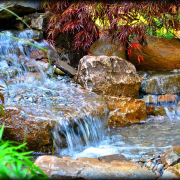 Koi Pond and Waterfall by Full Service Aquatics. Project site Cranford, NJ.