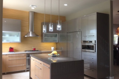Inspiration for a mid-sized contemporary l-shaped ceramic tile eat-in kitchen remodel in Phoenix with a double-bowl sink, light wood cabinets, granite countertops, stainless steel appliances and an island