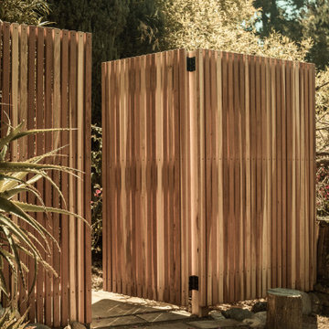 Wood slatted fencing and gate