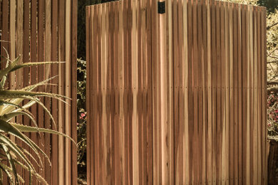 Wood slatted fencing and gate
