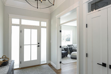 Example of a transitional entryway design in Other