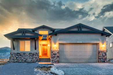 Example of an arts and crafts exterior home design in Denver