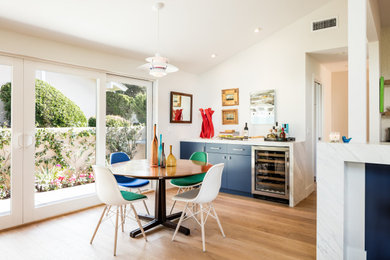 Example of a mid-sized 1960s dining room design in Orange County