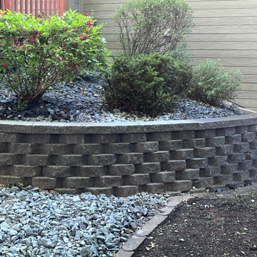 Custom Retaining Wall & Patio Integration in Wooded Backyard – Elk River