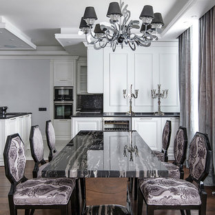 На фото: гостиные-столовые в стиле современная классика с белыми стенами и паркетным полом среднего тона