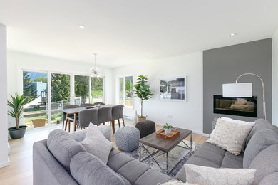 Example of a minimalist family room design in Other