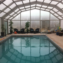 Indoor Pool Setting with our Retractable Pool Enclosures - Products