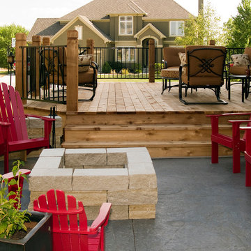 Lamb - Cedar deck in KC with stamped concrete patio. Firepit.