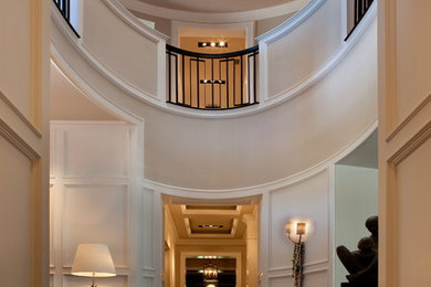 Inspiration for a huge transitional dark wood floor foyer remodel in Orlando with white walls