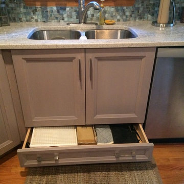 I think that drawers under the sink are very functional.