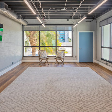 Industrial Office Lounge with Exposed Ceiling